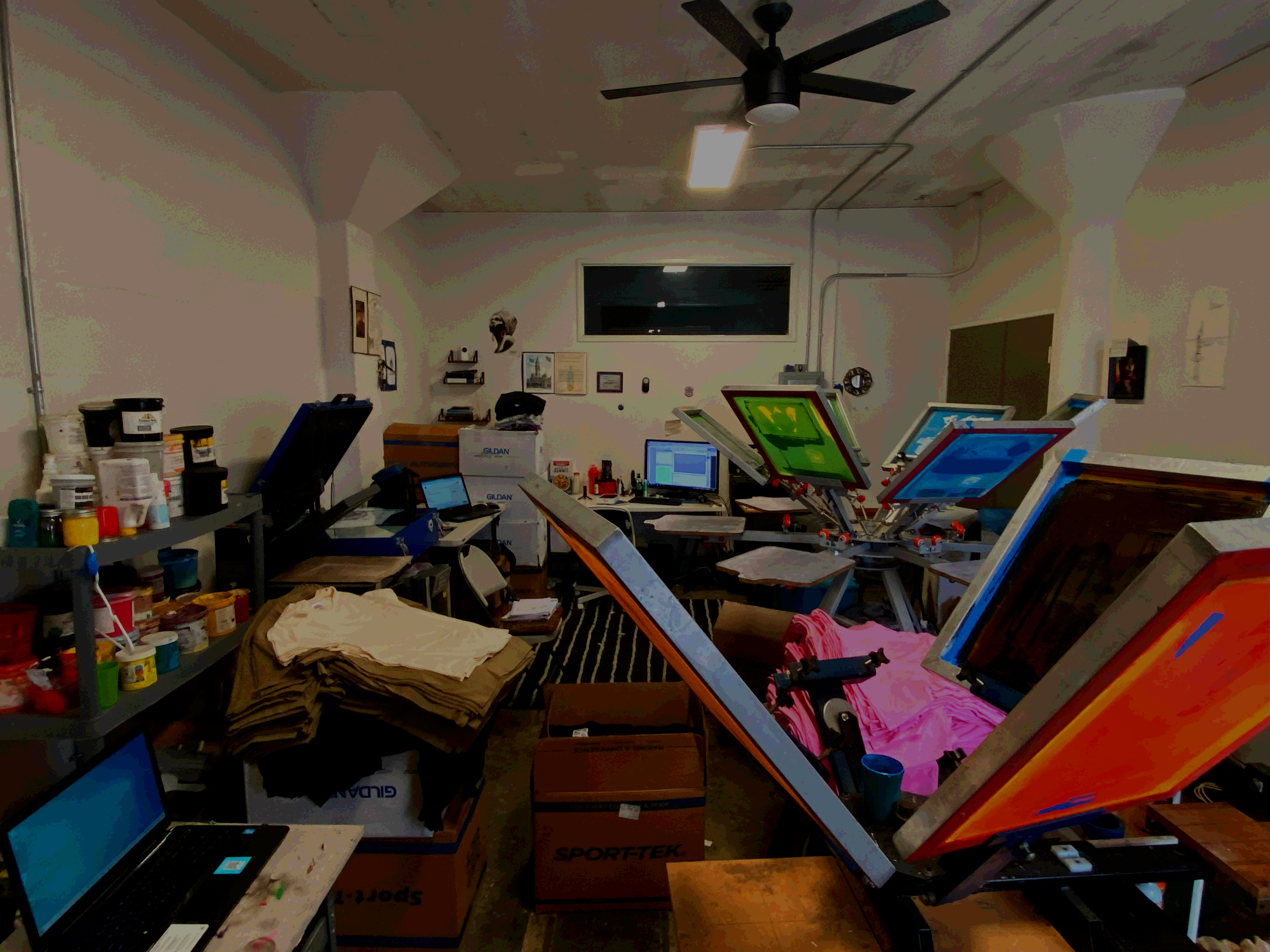 The workshop photograph used as the background on the original Statement Silk Screen homepage.