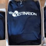 A navy hooded garment carries bold white Moose Nation lettering across the chest.